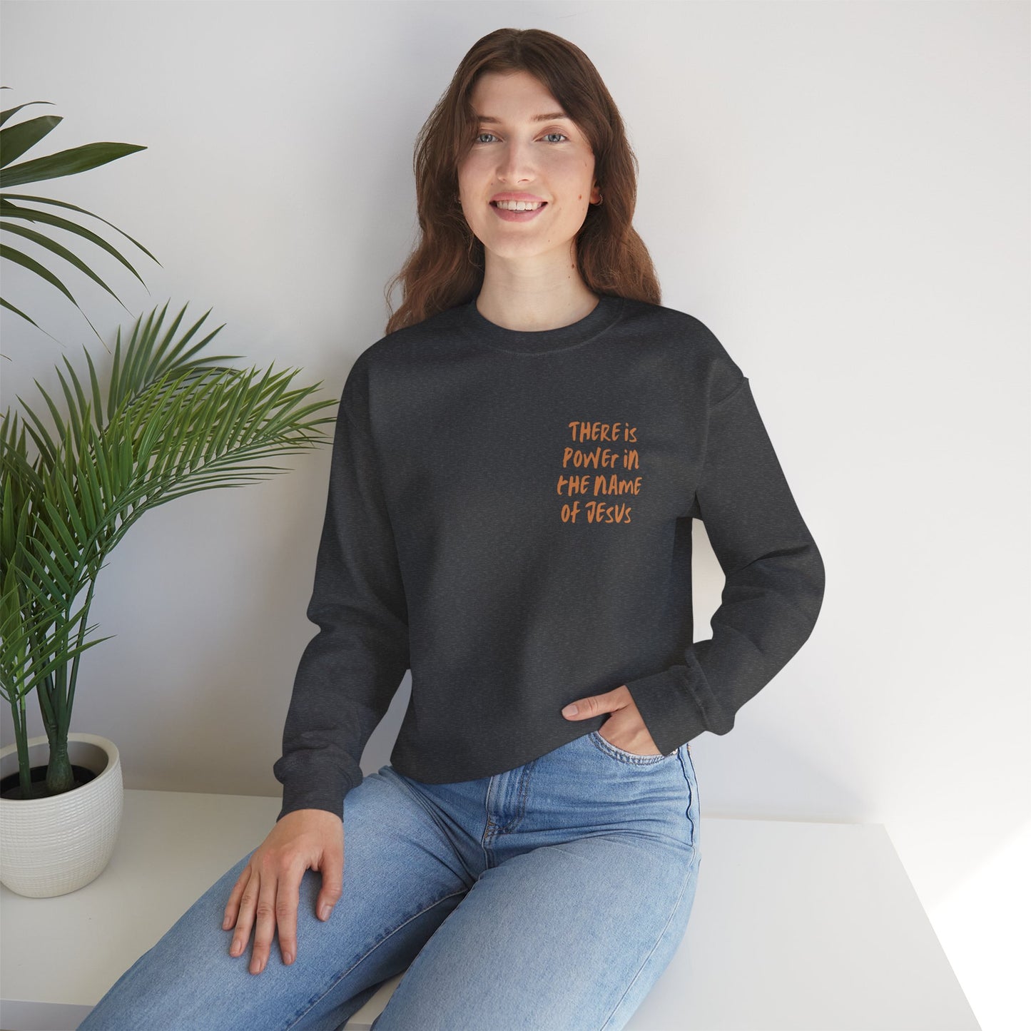 There is power in the name of Jesus Unisex Heavy Blend™ Crewneck Sweatshirt
