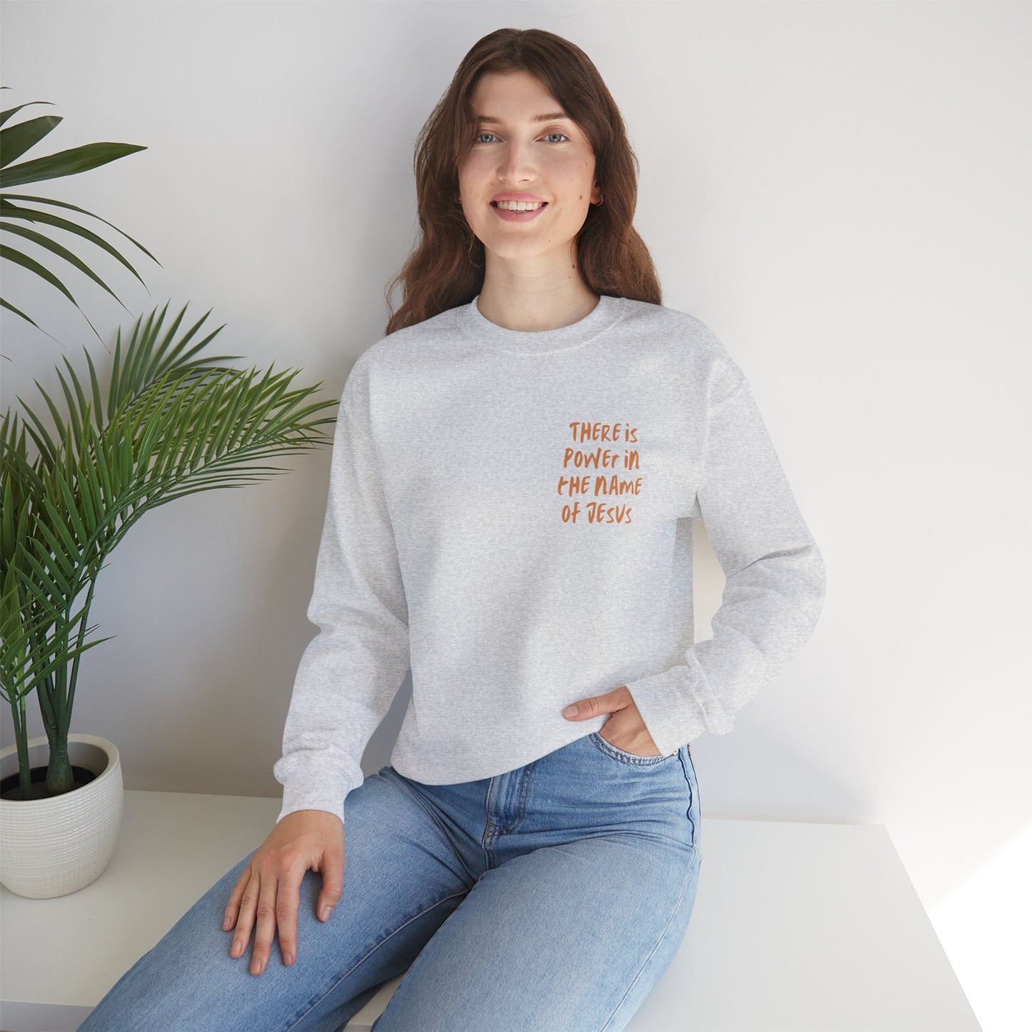 There is power in the name of Jesus Unisex Heavy Blend™ Crewneck Sweatshirt