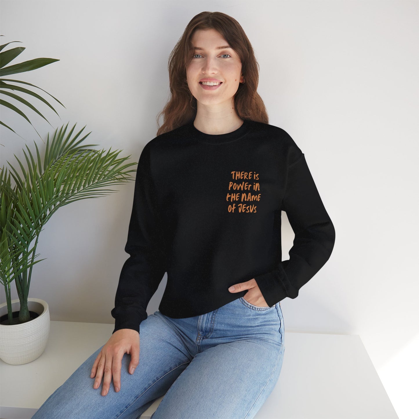There is power in the name of Jesus Unisex Heavy Blend™ Crewneck Sweatshirt