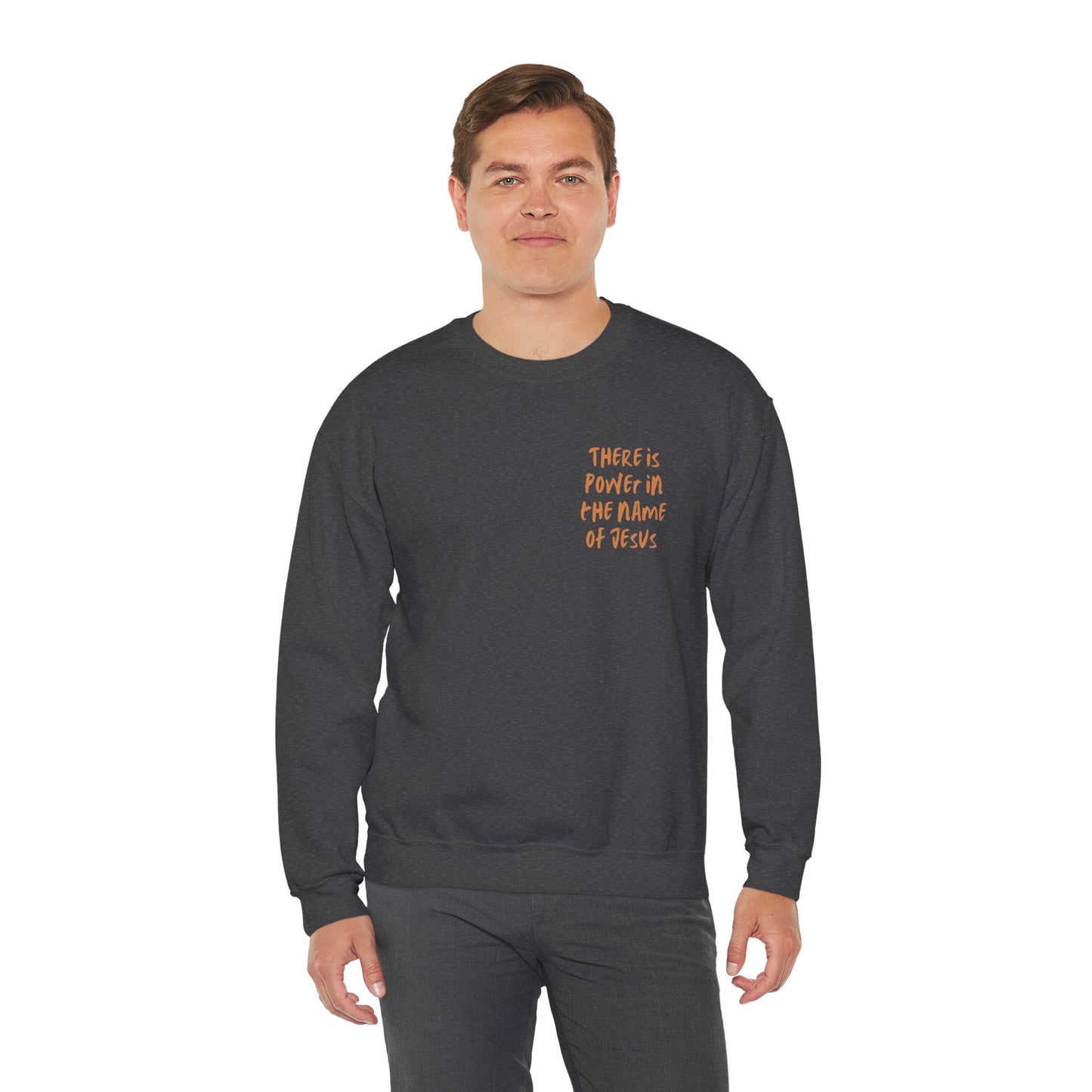 There is power in the name of Jesus Unisex Heavy Blend™ Crewneck Sweatshirt