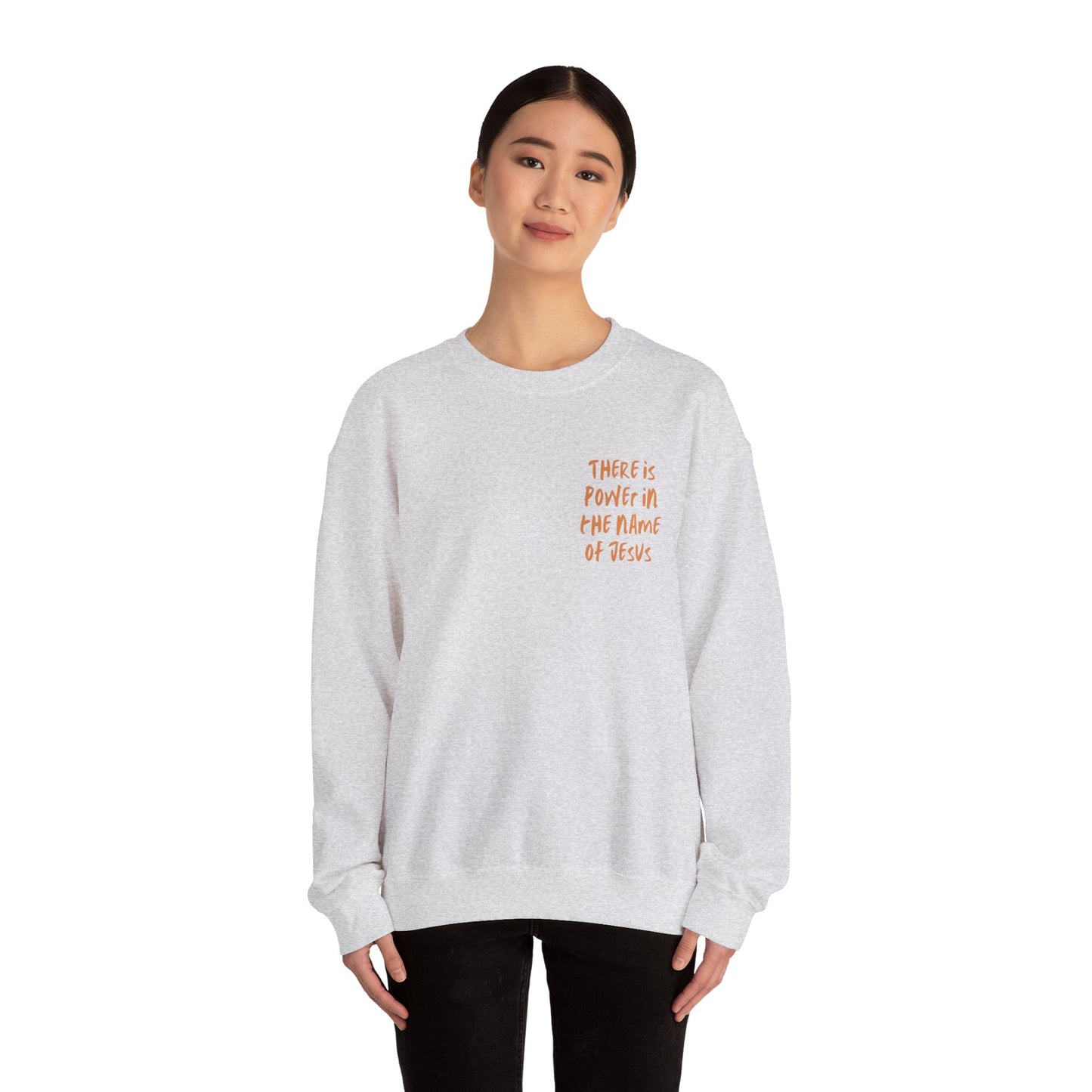 There is power in the name of Jesus Unisex Heavy Blend™ Crewneck Sweatshirt